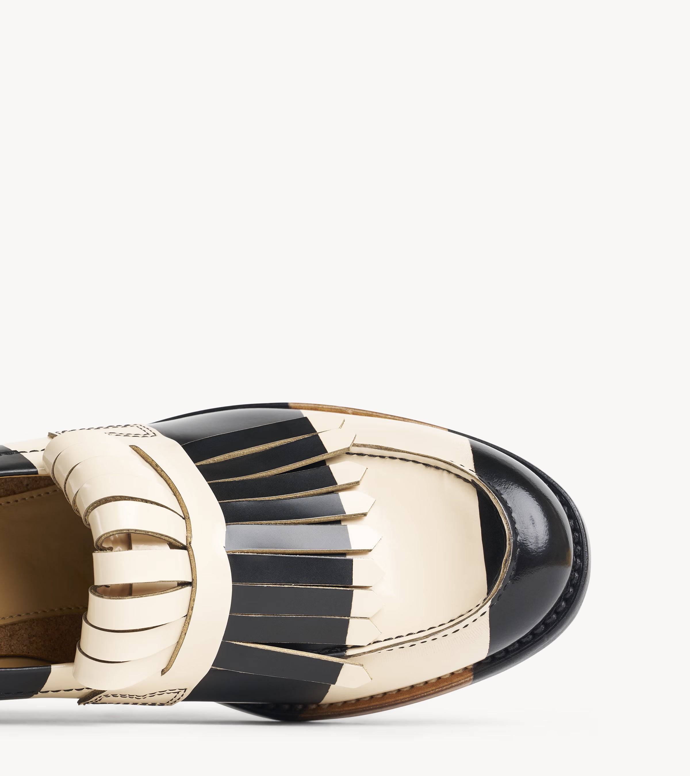Miss Day Loafer — close-up of the toe cap on the multicolor leather heel