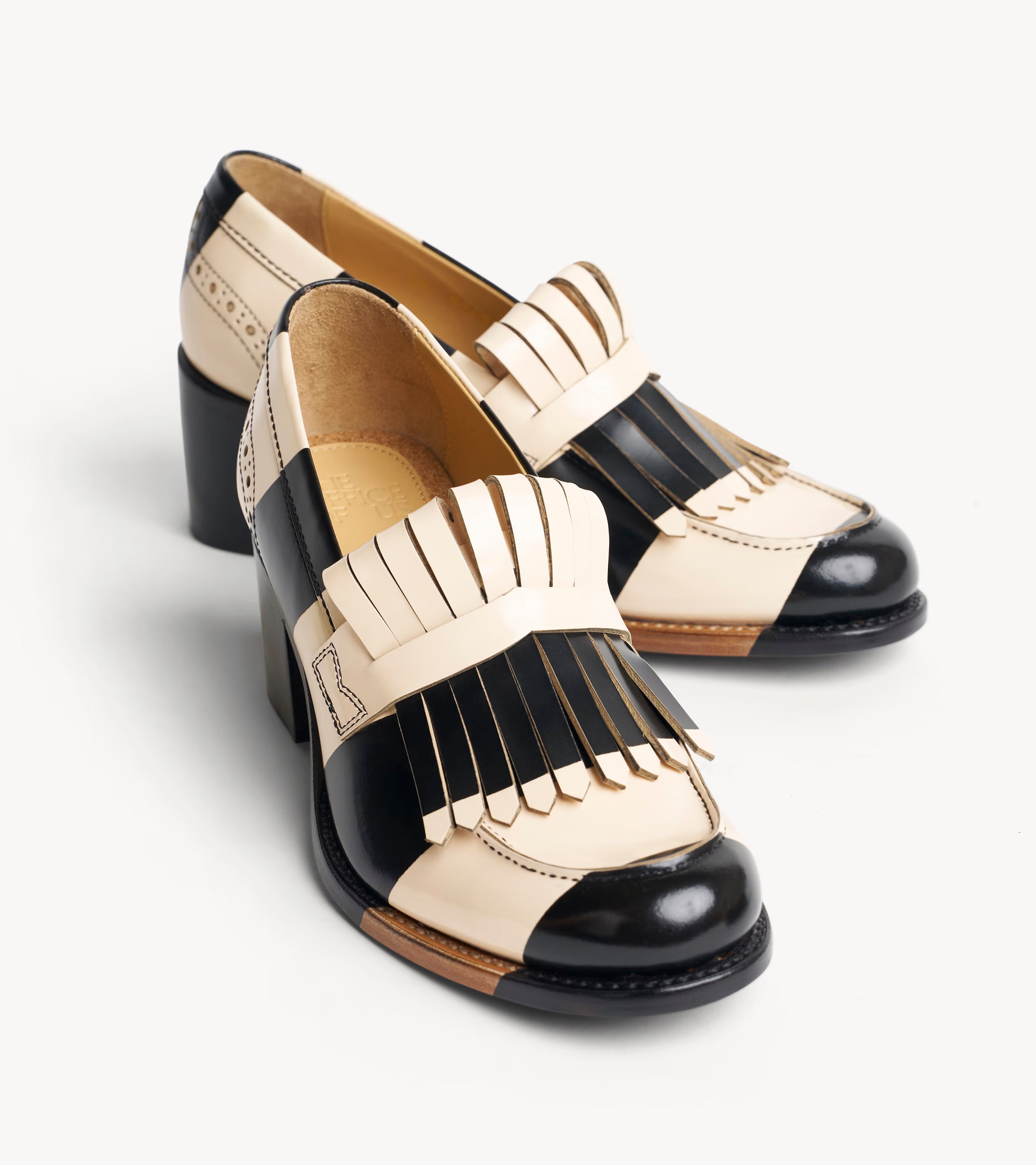 Miss Day Loafer — angled pair of multicolor leather heels
