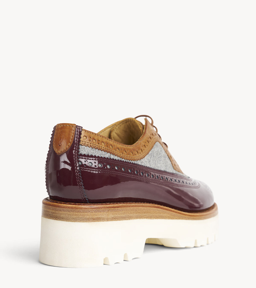 Miss Lucy Derby — angled pair of multicolor patent leather oxfords