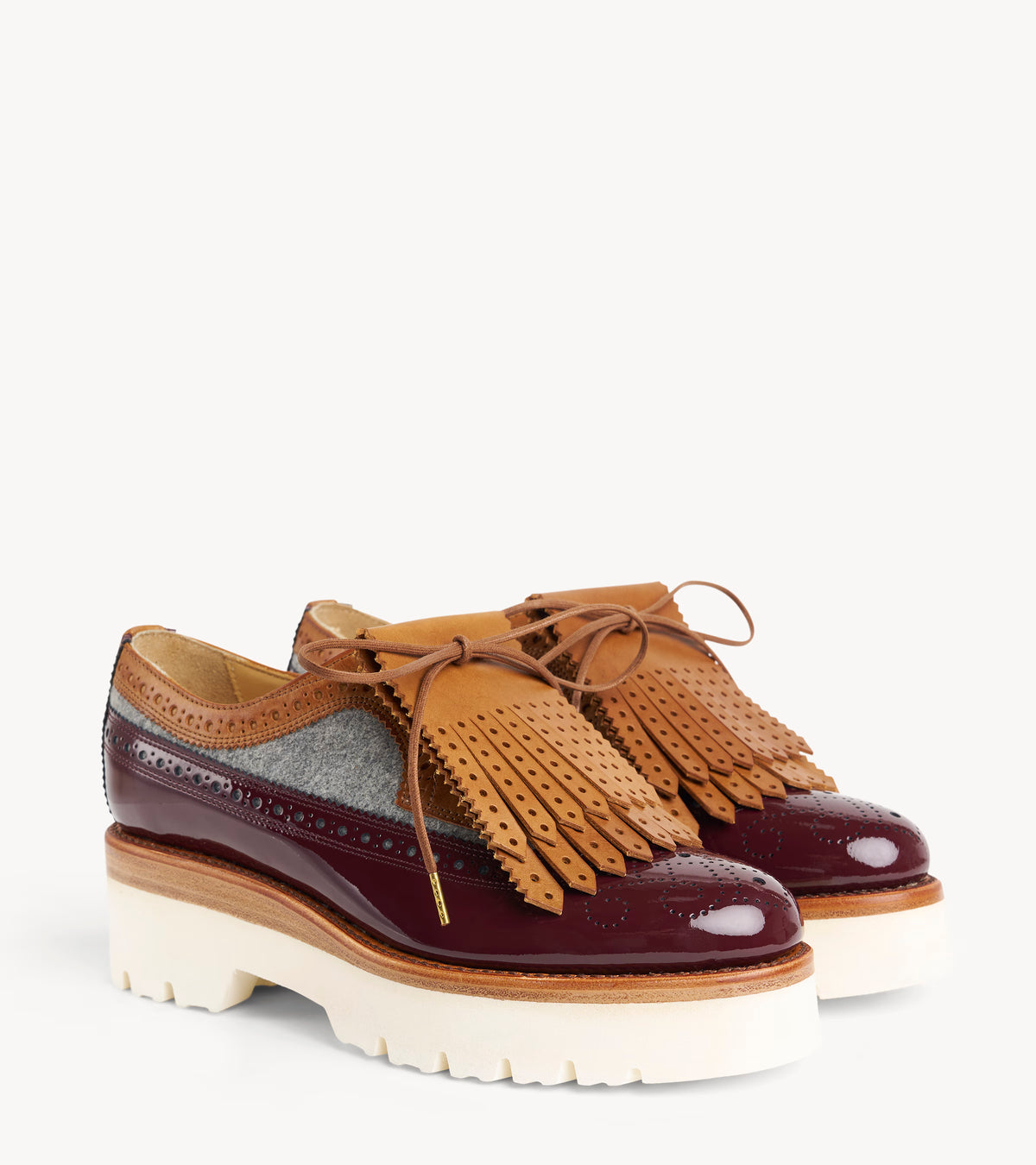 Perf Kiltie — pair of veg leather shoe accessorieses