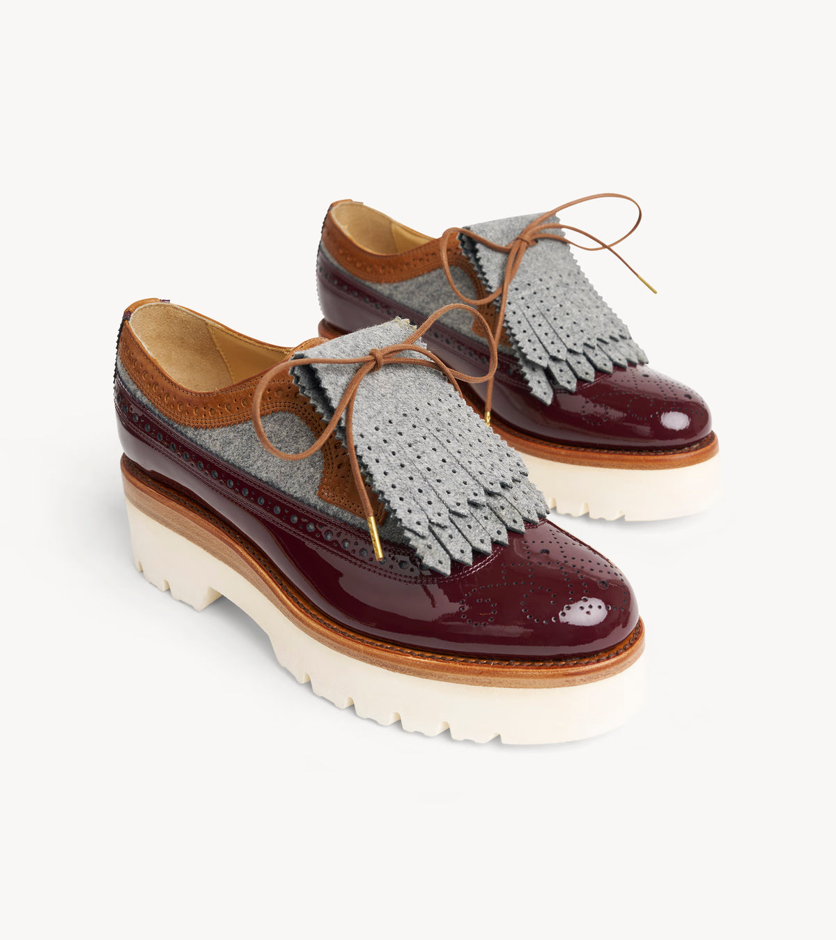Perf Kiltie — pair of wool shoe accessorieses