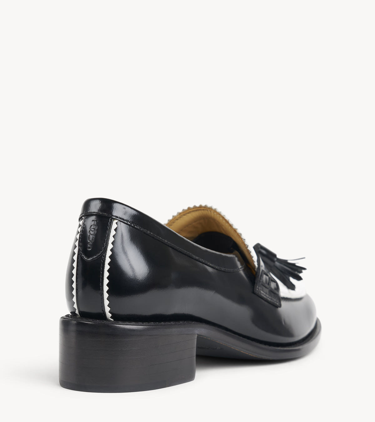 Miss Tenley Loafer — back three-quarter view of the black leather loafer