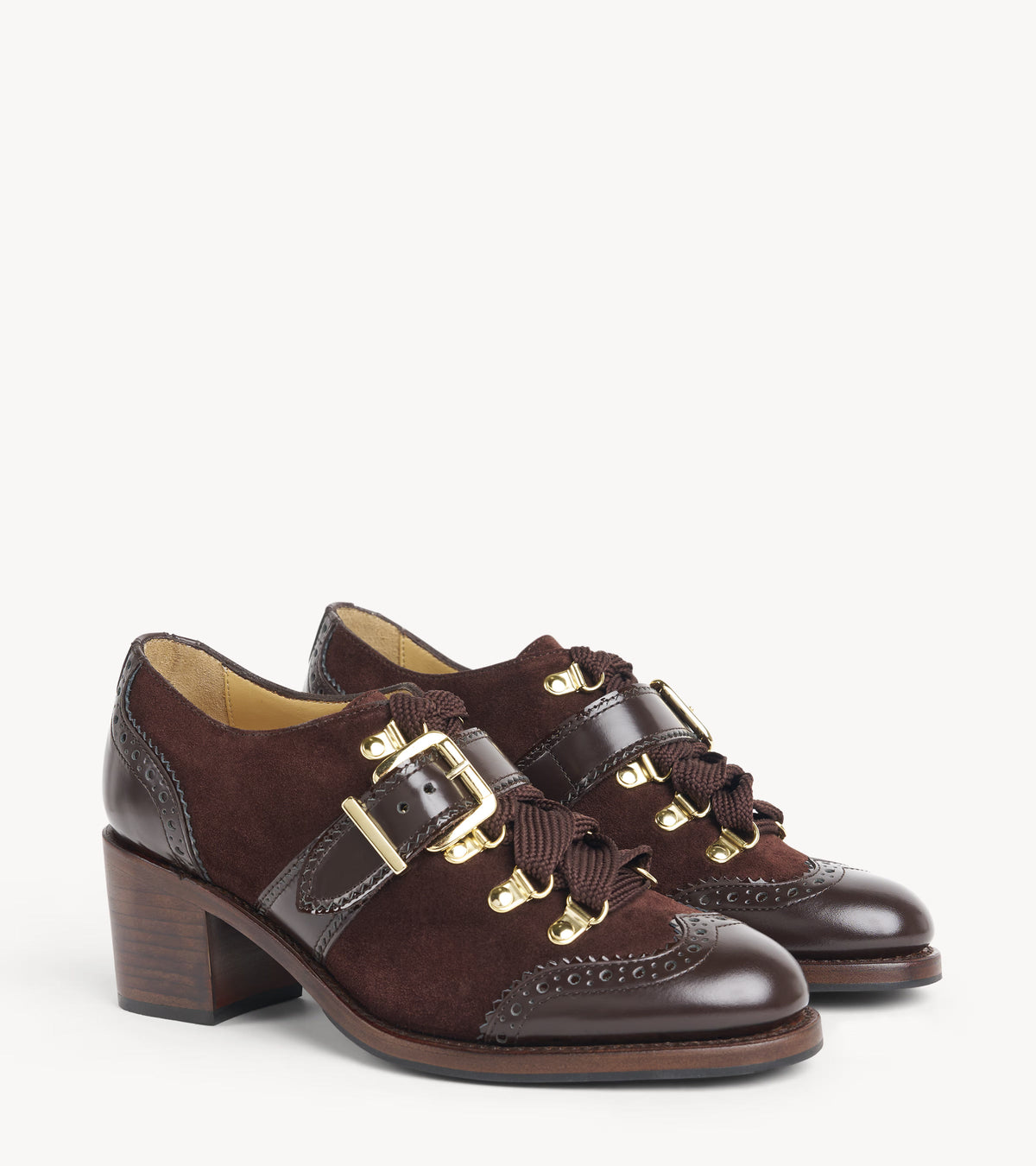 Mrs. Logan Midheel — pair of brown suede heels