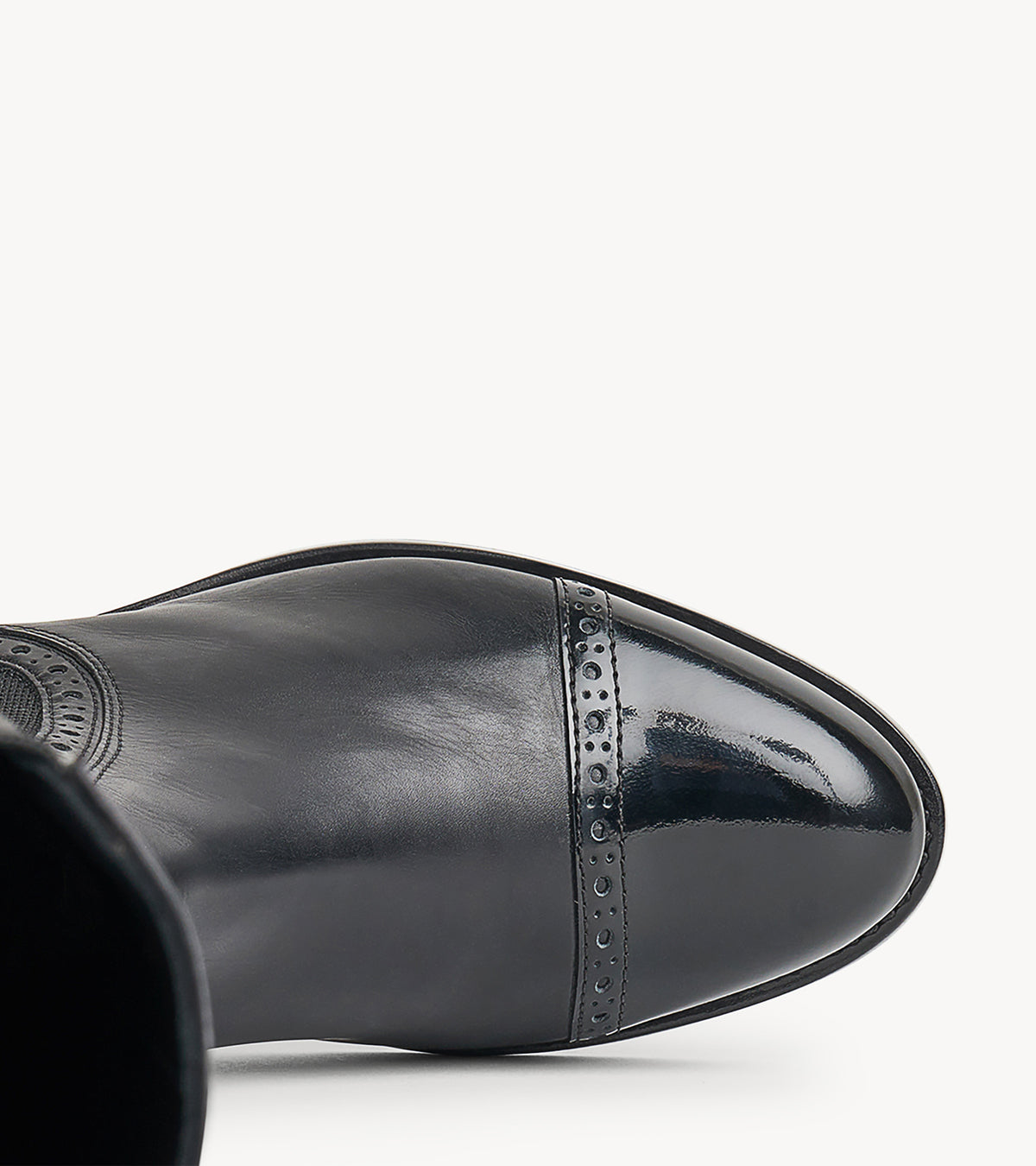 Ms. Brigitte Boot