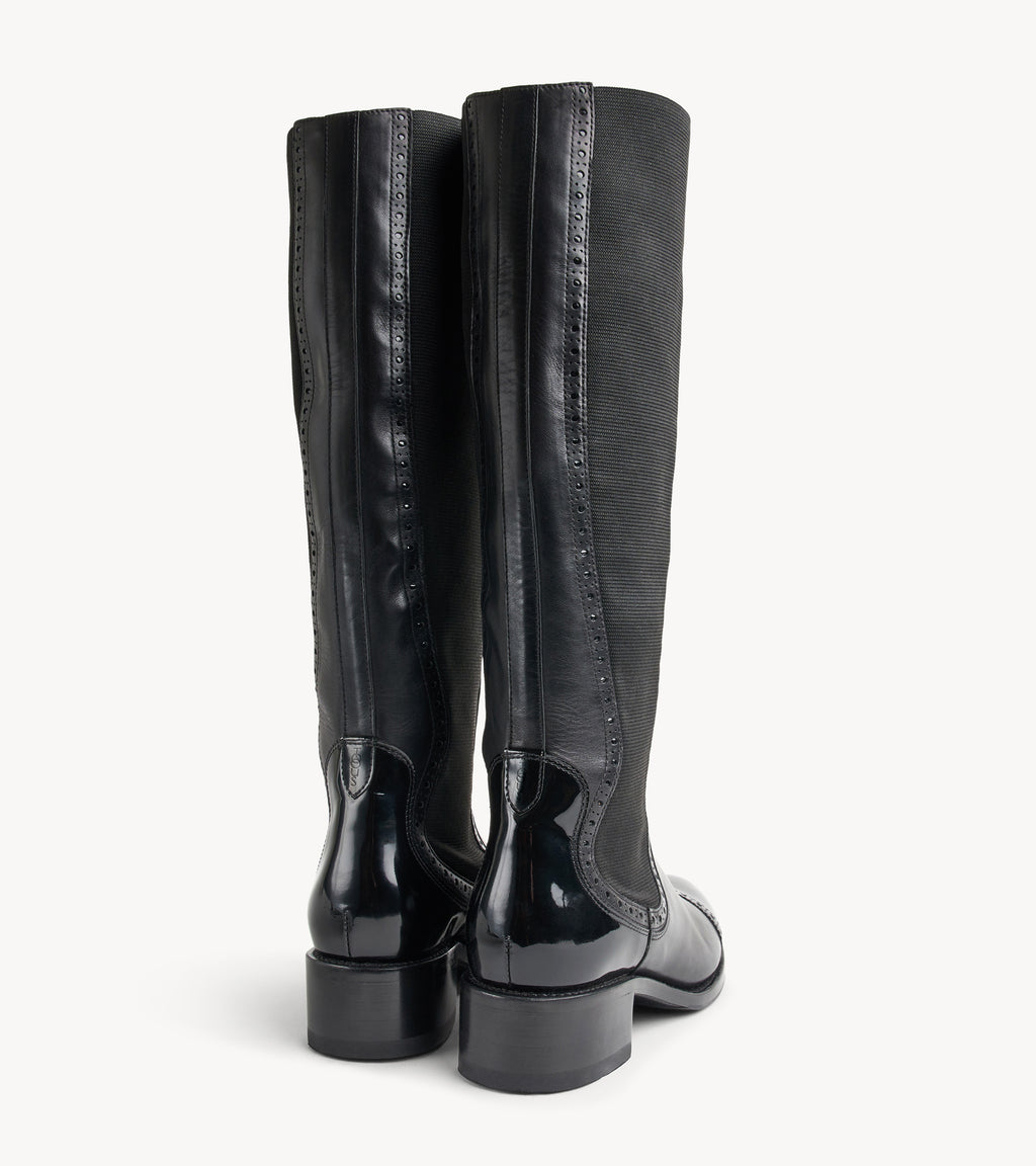 Ms. Brigitte Boot