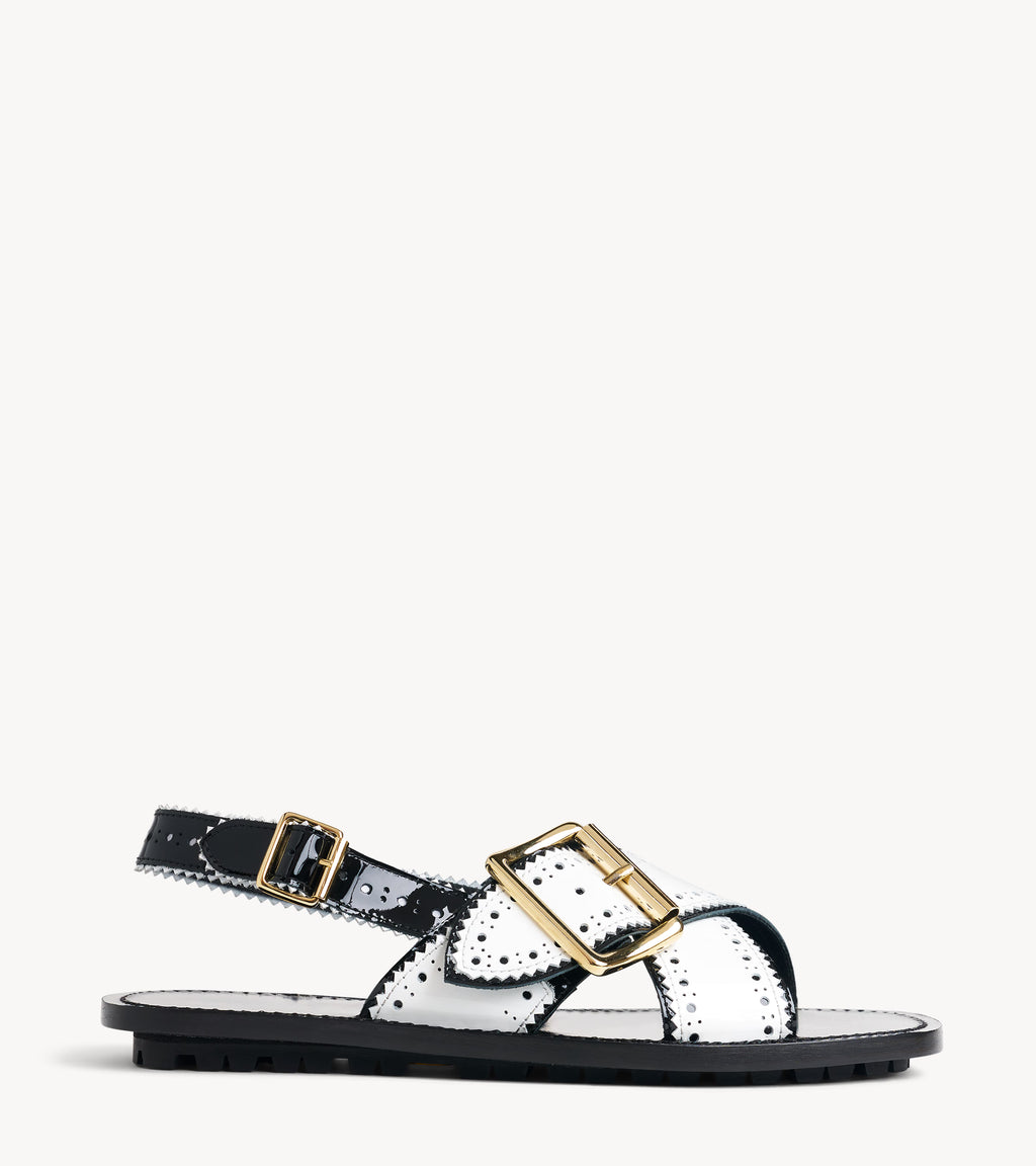 Ms. Camille Sandal