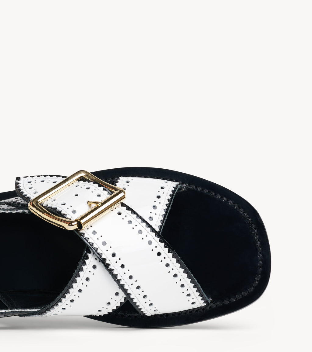 Ms. Camille Sandal