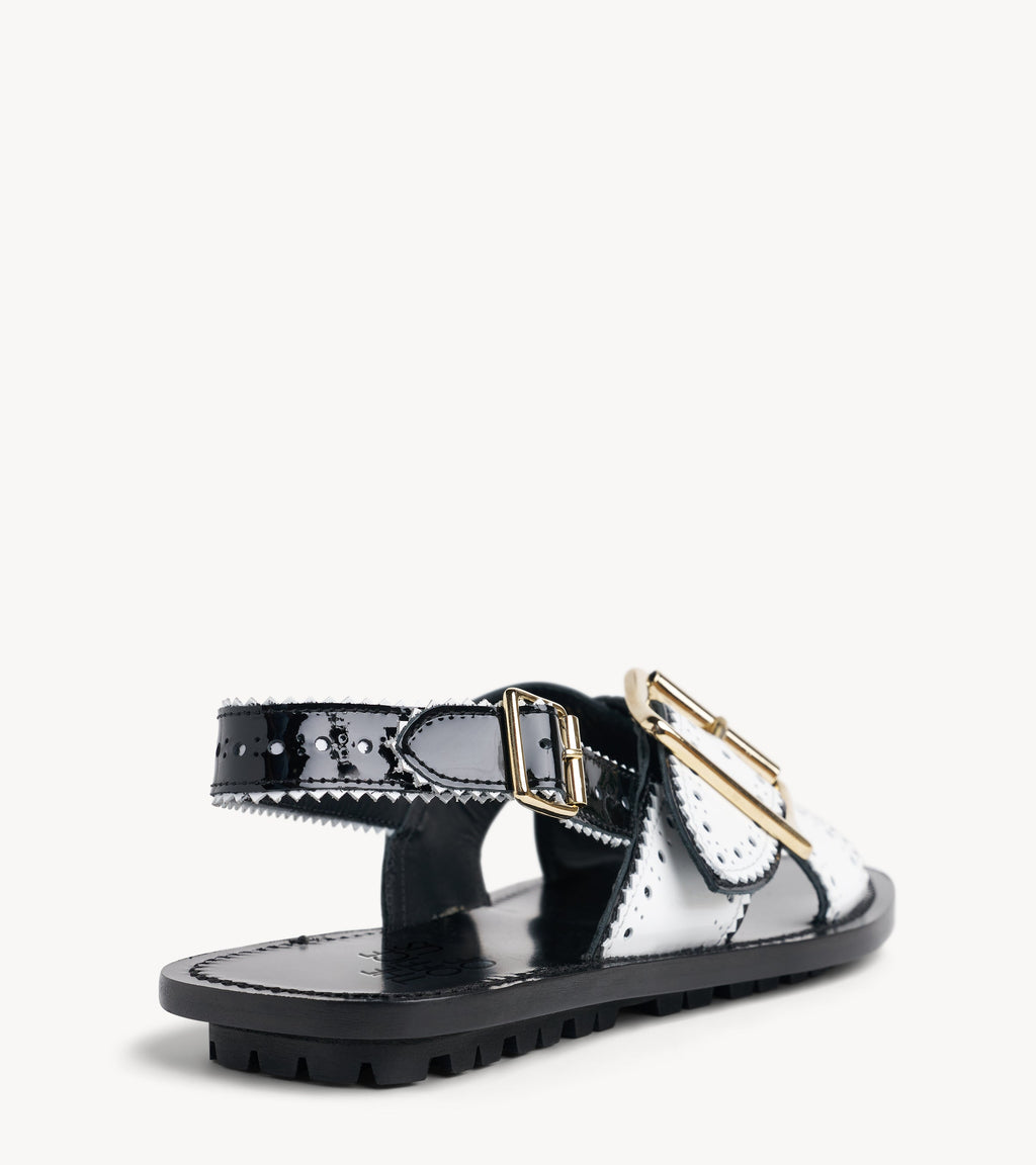 Ms. Camille Sandal