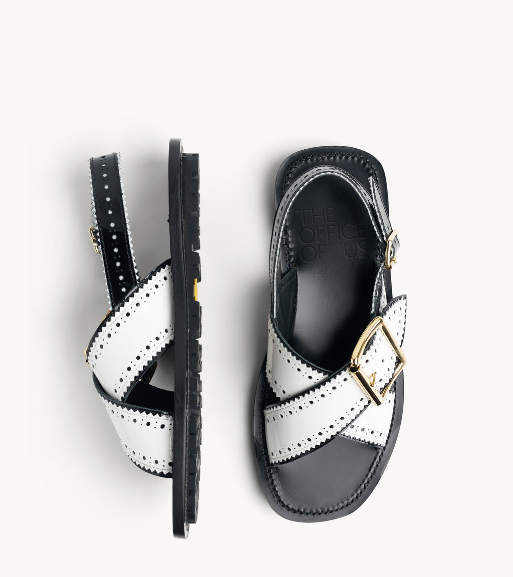 Ms. Camille Sandal