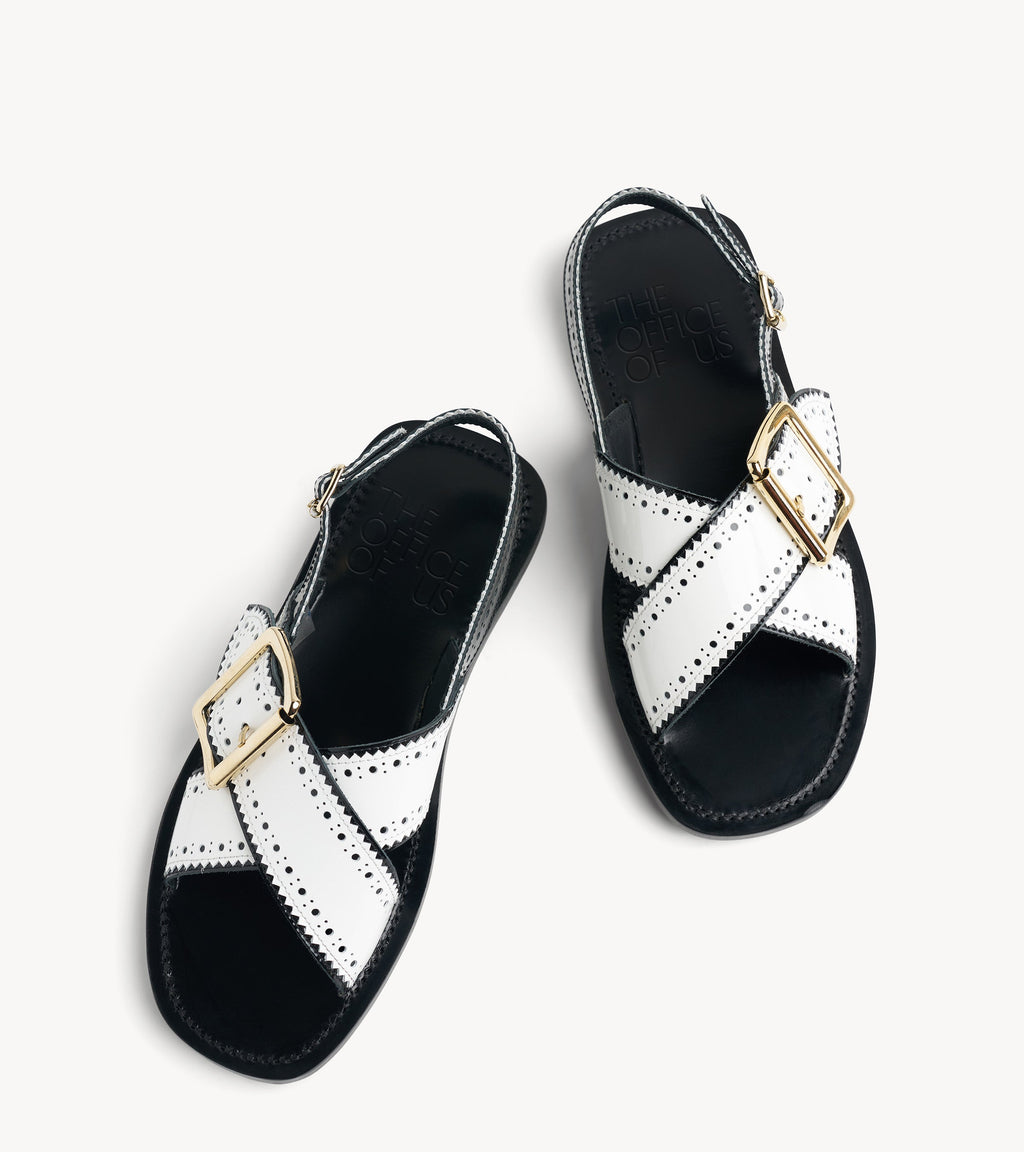 Ms. Camille Sandal