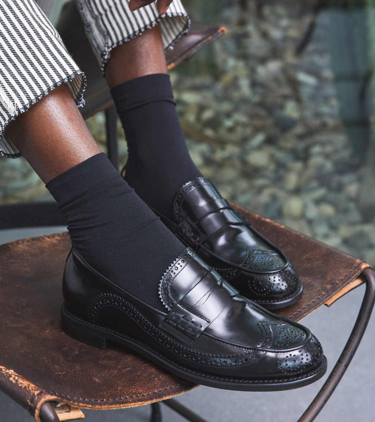 Ms. Charlotte Loafer — close-up of the vamp on the black leather brogue loafer