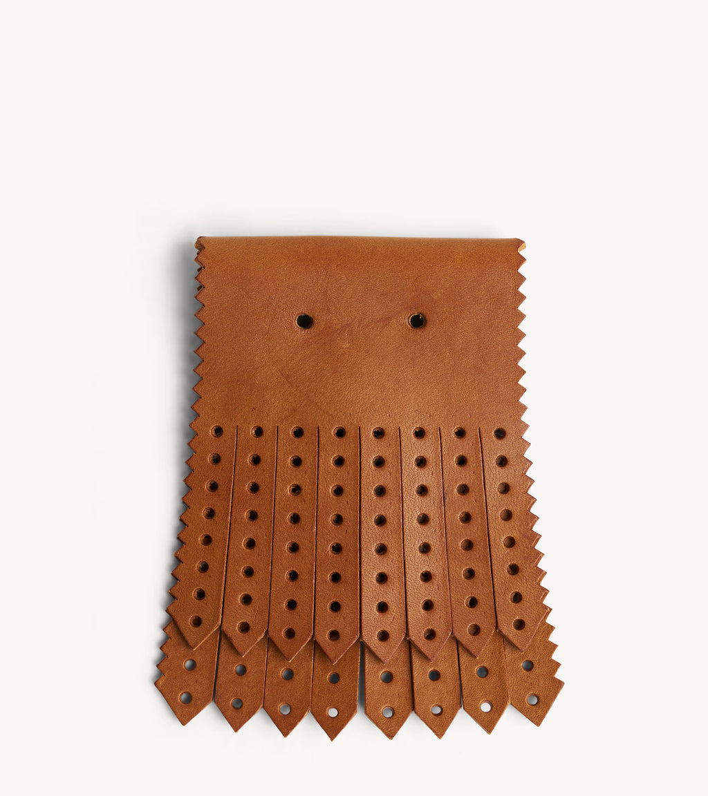 Perf Kiltie — back three-quarter view of the veg leather shoe accessories