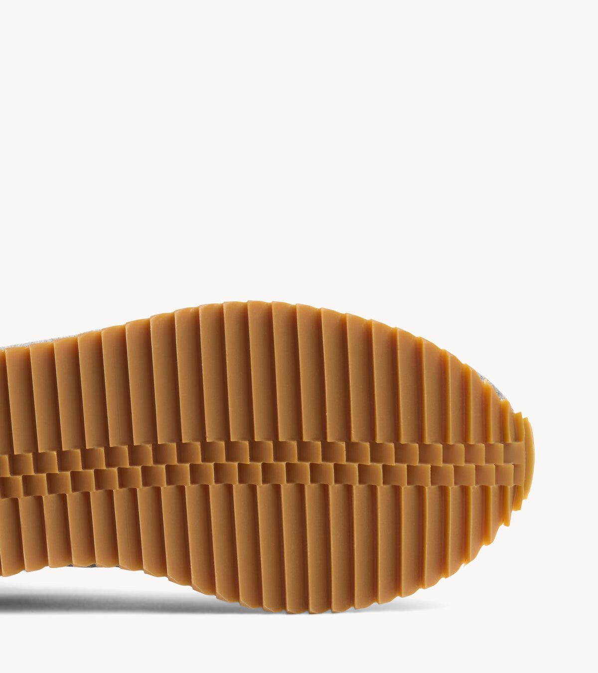 The Quinn Sneaker — rubber sole of the grey wool sneaker