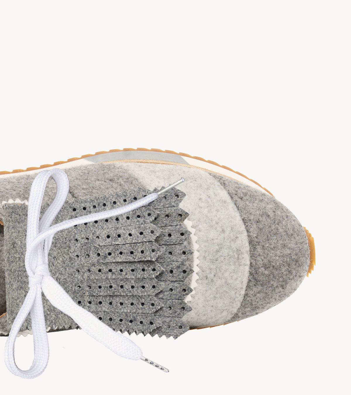 Perf Kiltie — close-up of the toe cap on the wool shoe accessories