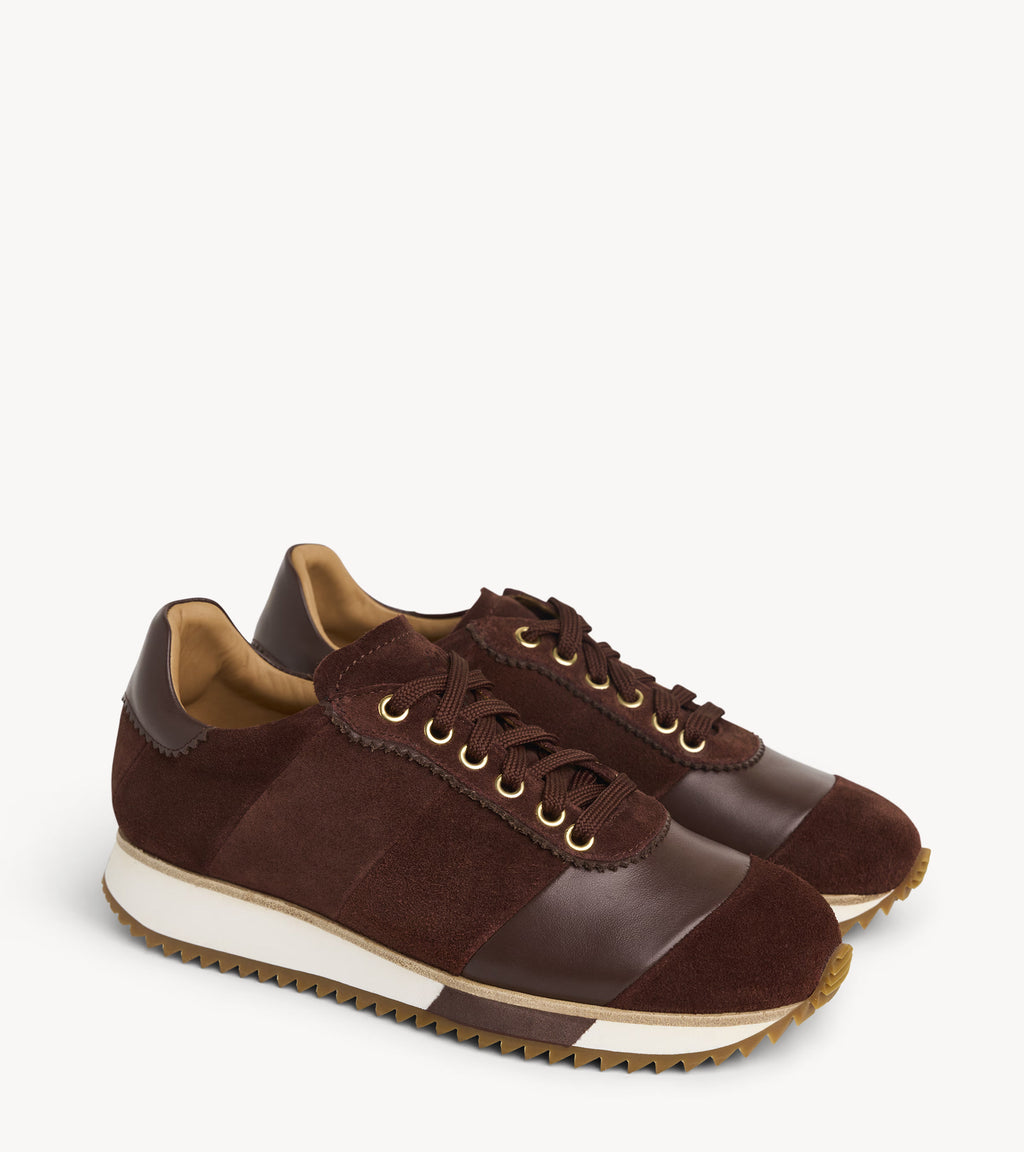 The Quinn Sneaker — pair of brown suede sneakerses
