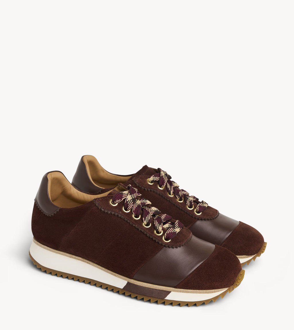 The Quinn Sneaker — angled pair of brown suede sneakerses