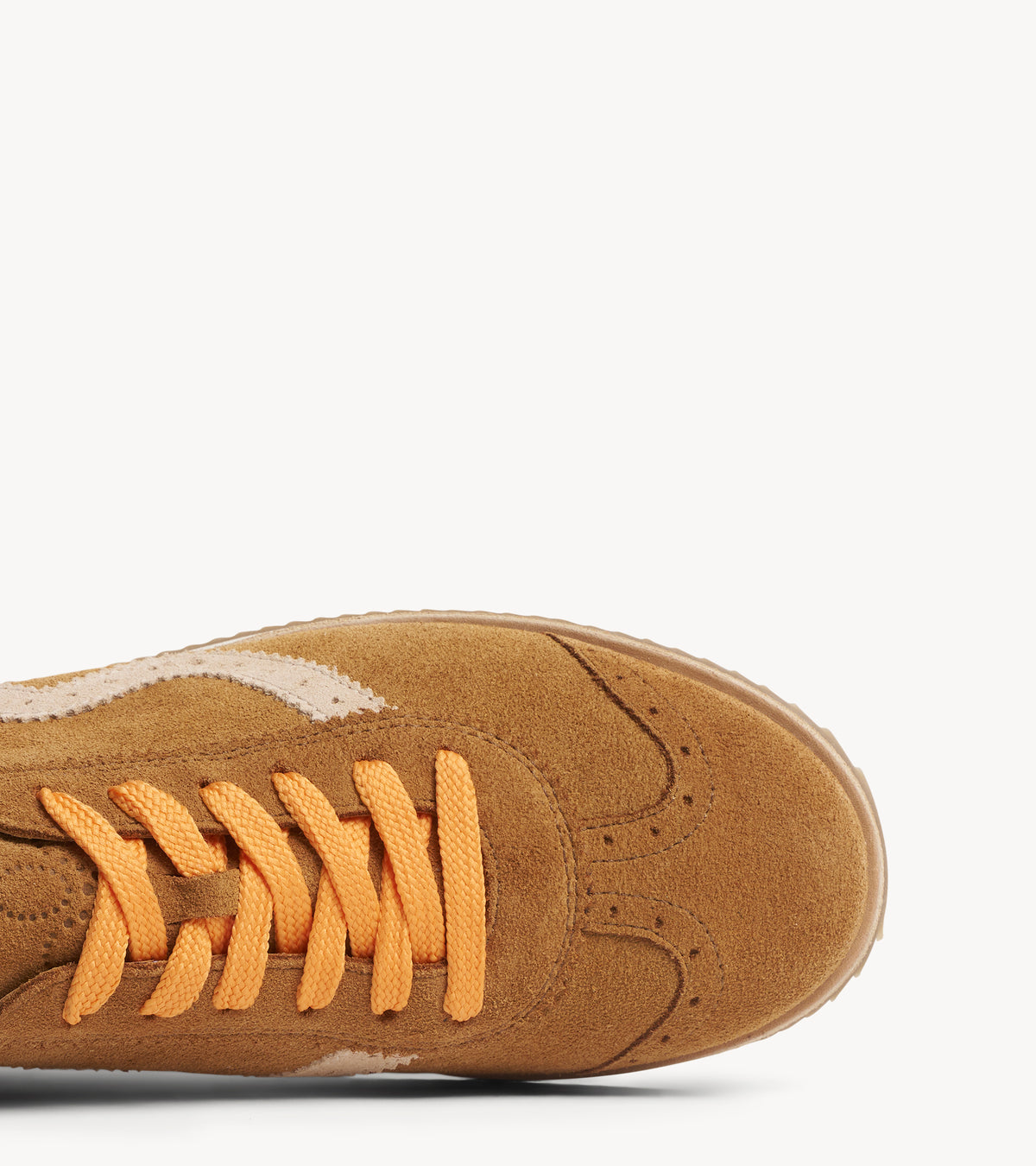 The Remi Slim Sneaker — back three-quarter view of the multicolor suede sneakers